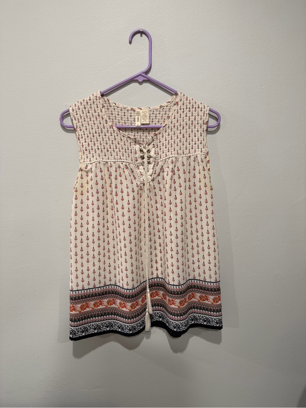 Cream Sleeveless shirt with Red and Navy Accents